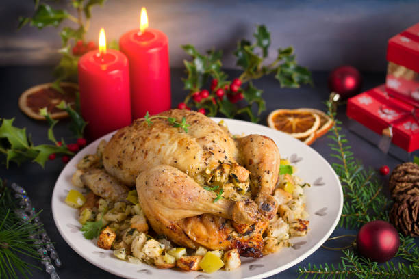 istock Roasted chicken stuffed with apple bread and celery. Christmas Thanksgiving dinner 1276596039