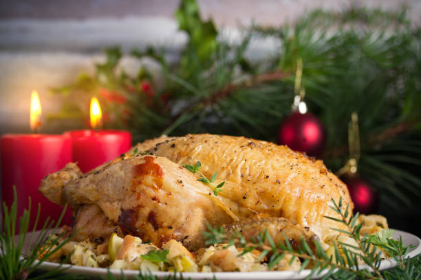 istock Roasted chicken stuffed with apple bread and celery. Christmas Thanksgiving dinner 1276596070