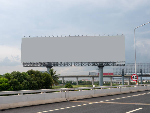 istock Empty billboard in front of beautiful cloudy sky in a rural location 1276596210
