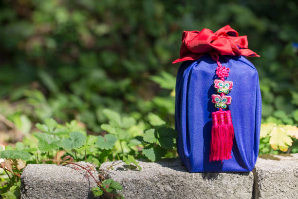 istock Korean traditional wrapping decorated with silk and an ornament. 1276597671