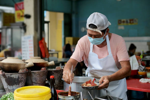 istock Small Business - Claypot Chicken Rice 1276597796