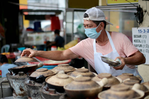 istock Small Business - Claypot Chicken Rice 1276597798