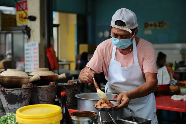 istock Small Business - Claypot Chicken Rice 1276597801
