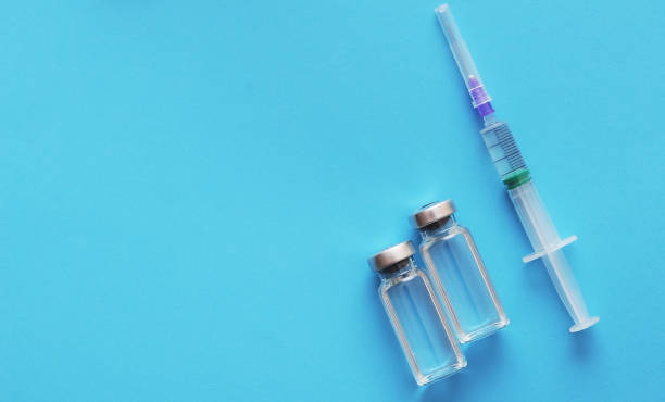 istock Syringe and vaccine. Covid. Coronavirus epidemic. 1276597917