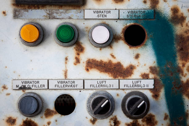 istock Closeup of old rusty buttons on a old vintage machine 1276603361