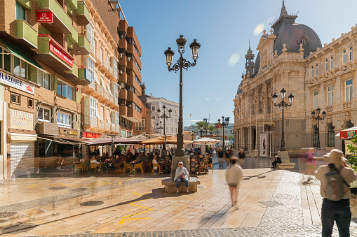 Cartagena Spain Nov 07 2019 :crowd people tourists walking at Consistorial Palace, Cartagena, Murcia,City hall of Cartagena in Spain