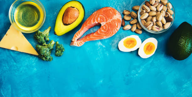 istock Keto diet, food on blue background. Selective focus 1276606221