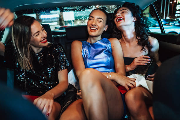 istock Girls are having fun in the cab 1276607377
