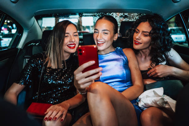 istock Girls are having fun in the cab 1276607384