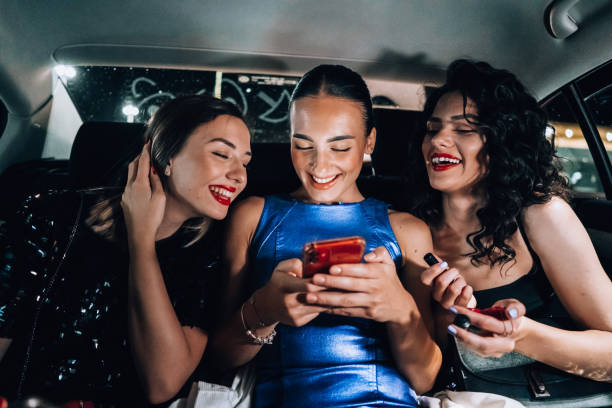 istock Girls are having fun in the cab 1276607442