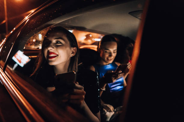istock Girls are having fun in the cab 1276607472