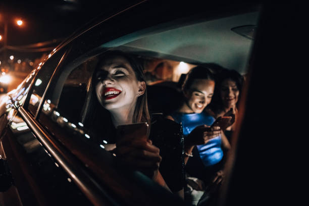 istock Girls are having fun in the cab 1276607485