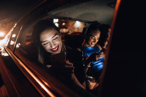 istock Girls are having fun in the cab 1276607492
