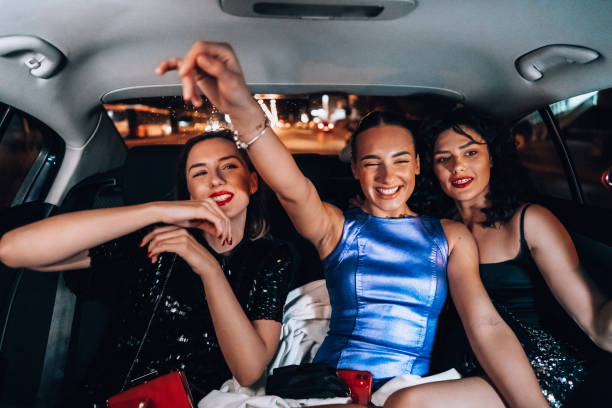 istock Girls are having fun in the cab 1276607495
