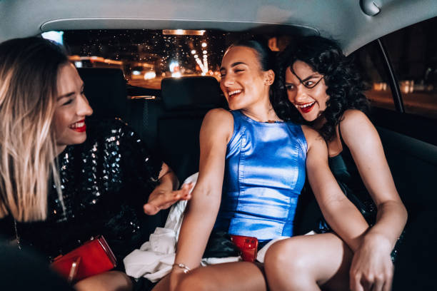istock Girls are having fun in the cab 1276607524