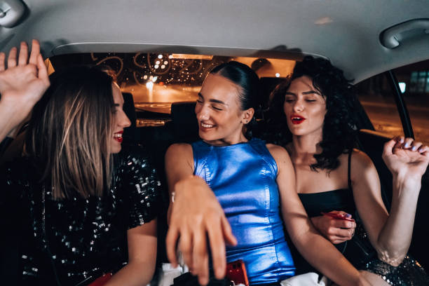 istock Girls are having fun in the cab 1276607526