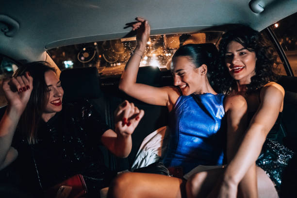 istock Girls are having fun in the cab 1276607533