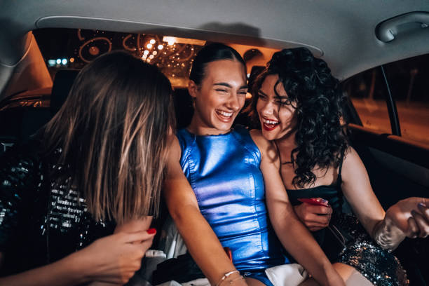 istock Girls are having fun in the cab 1276607536