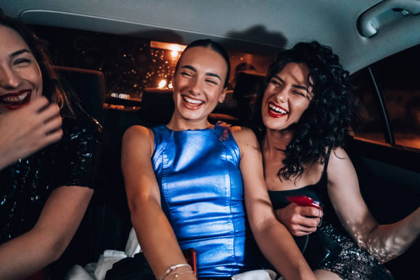 istock Girls are having fun in the cab 1276607572