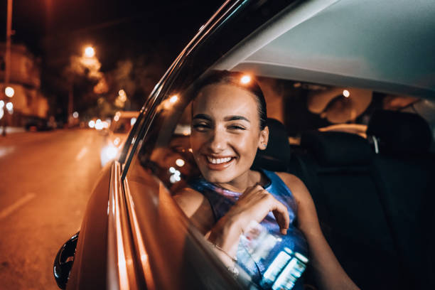 istock Beautiful girl in the cab 1276607627