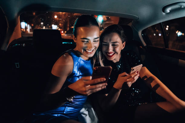 istock Girls are having fun in the cab 1276607646