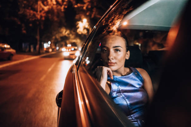 istock Beautiful girl in the cab 1276607647
