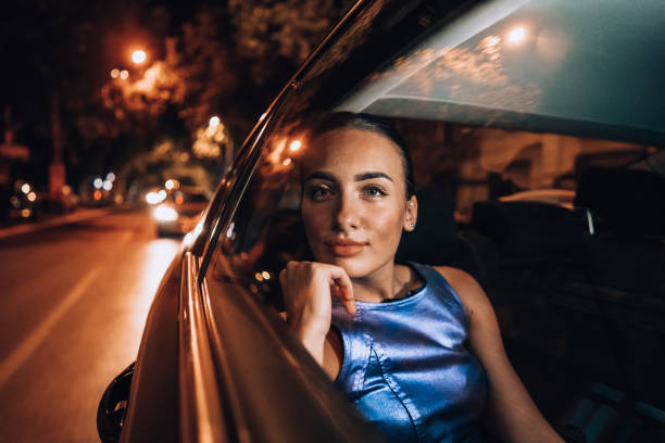 istock Beautiful girl in the cab 1276607654