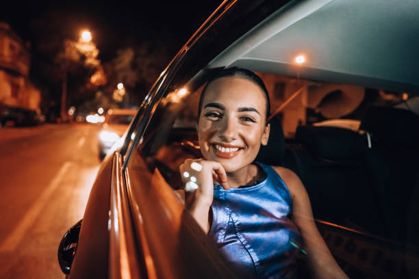 istock Beautiful girl in the cab 1276608179