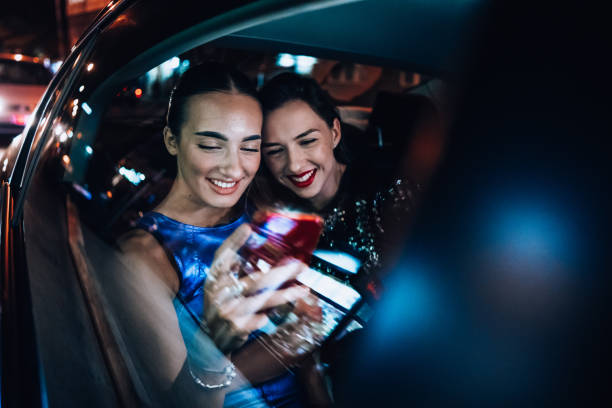 istock Girls are having fun in the cab 1276608197
