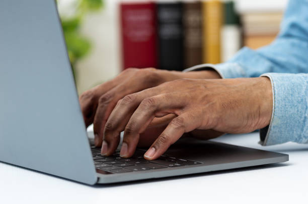 istock business person typing on a laptop 1276608204