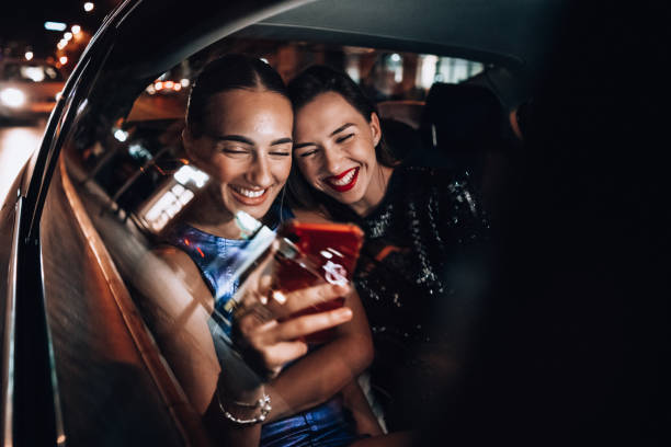 istock Girls are having fun in the cab 1276608207