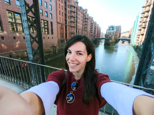 istock Woman making selfie in Hamburg old town 1276609986
