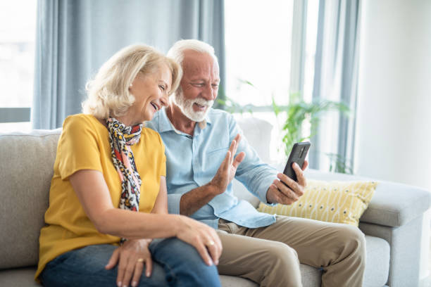 istock Seniors using phone for a video call with family. 1276610364