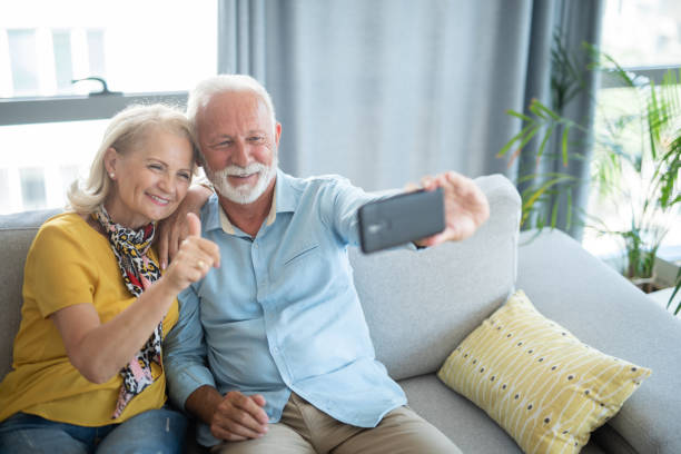 istock Seniors capturing a memory in the living room. 1276610401