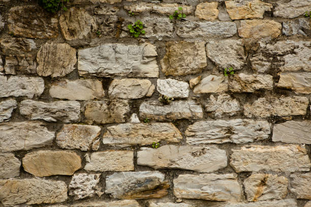 istock Ancient wall of white stone. Brick wall background image. High quality photo 1276613392