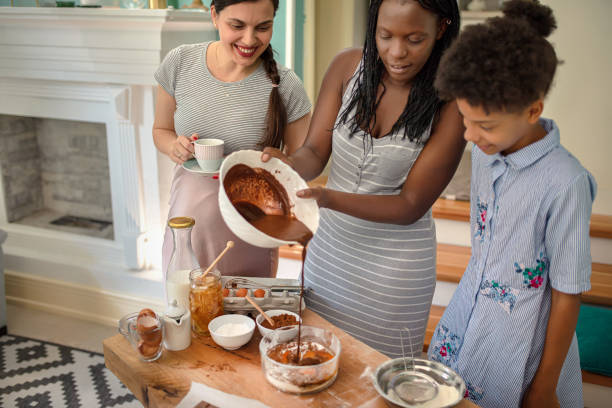 istock Baking with family in kitchen 1276613400