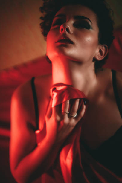 istock Sad lonely woman in bed 1276614561