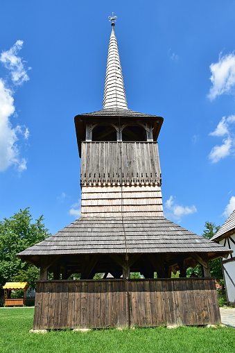 Old wooden church tower in the village