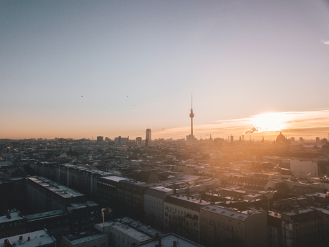 Beautiful Sunrise Morning above Berlin, Germany with Skyline Building Silhouette of Alexanderplatz and Smoke HQ
