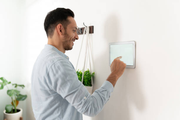 istock Latin man enjoying his smart home 1276617968