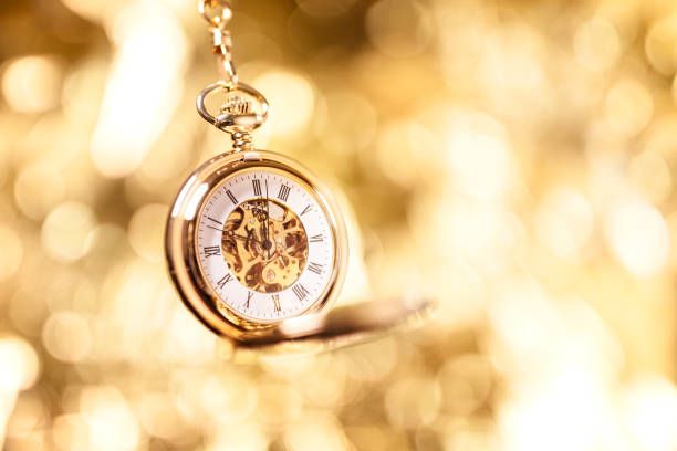 Gold pocket watch background Gold pocket watch background watch timepiece photos stock pictures, royalty-free photos & images