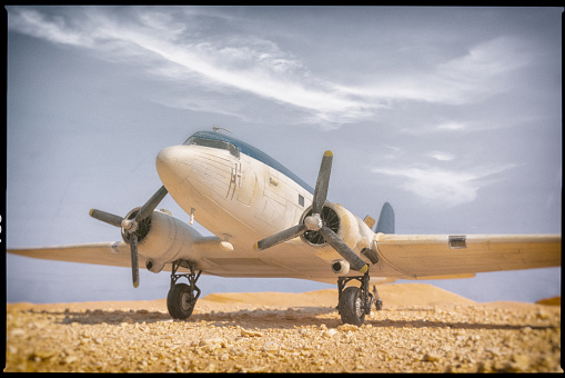 Commercial passenger airplane in 1951. DC-3. Scanned film with significant grain.