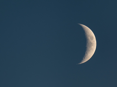 Lunar surface. Photo of the moon through a telescope.