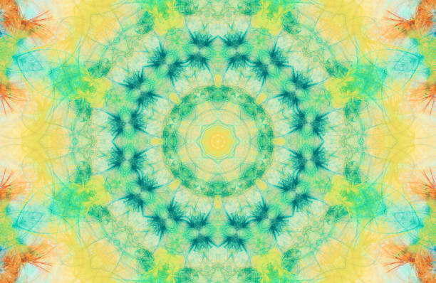 istock Shiny geometric kaleidoscope texture in  yellow and turquoise colors . Psychedelic eastern decor 1276623355