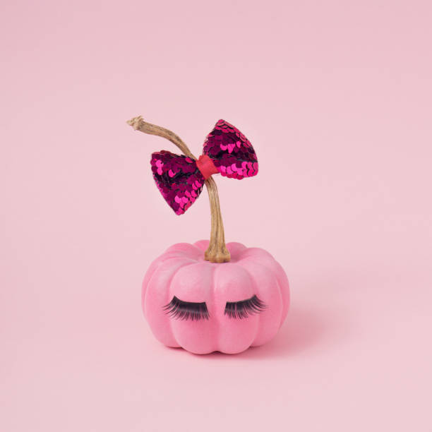 istock Pink Halloween pumpkin with make up. 1276623410