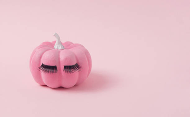 Pink Halloween pumpkin with make up.