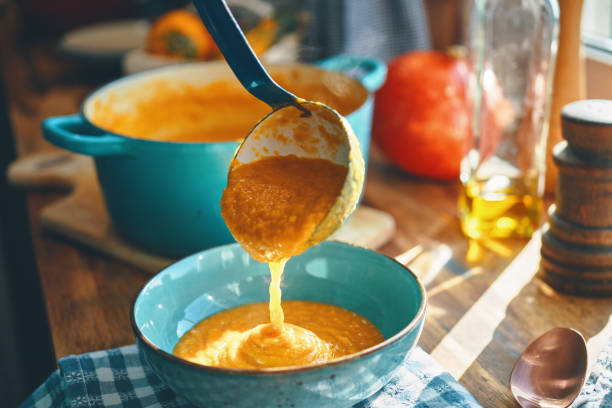istock Preparing Pumpkin Soup with Blender in Domestic Kitchen 1276624817
