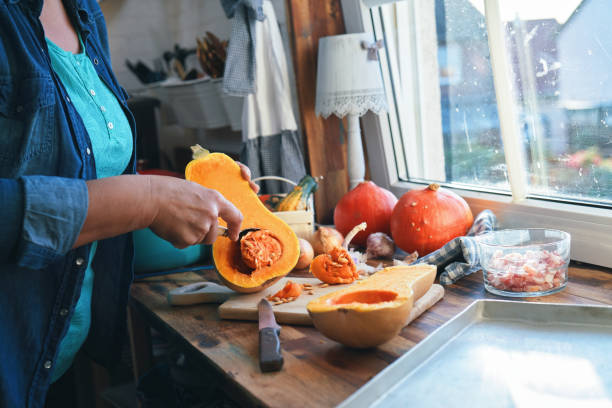istock Preparing Pumpkin Soup with Blender in Domestic Kitchen 1276624944