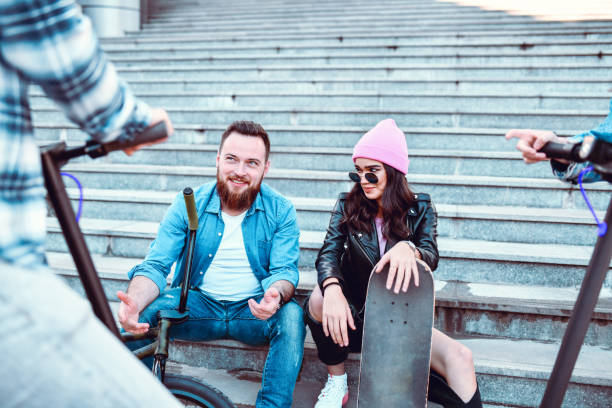 istock Modern Friends Enjoying Spending Time Outside With Each Other 1276626834