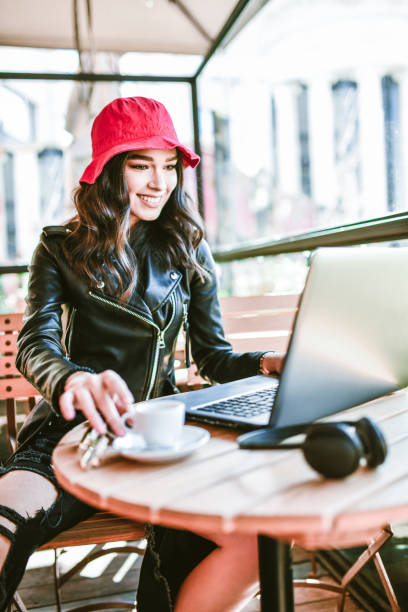 istock Coffee And Laptop Time For Cute Smiling Female Freelancer 1276627103